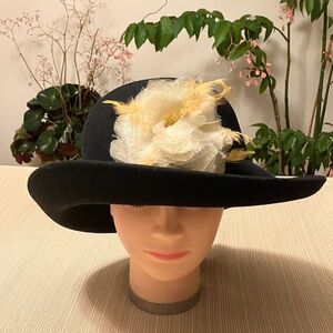 Elegant Black Wool Hat with Cream Golden Feathered Floral Accent